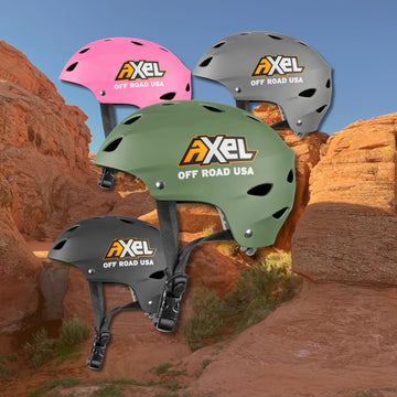 Off Road Trail Helmet Helmets by AXEL OffRoad. Pink helmet, gray helmet, black helmet, and green helmet displayed together.