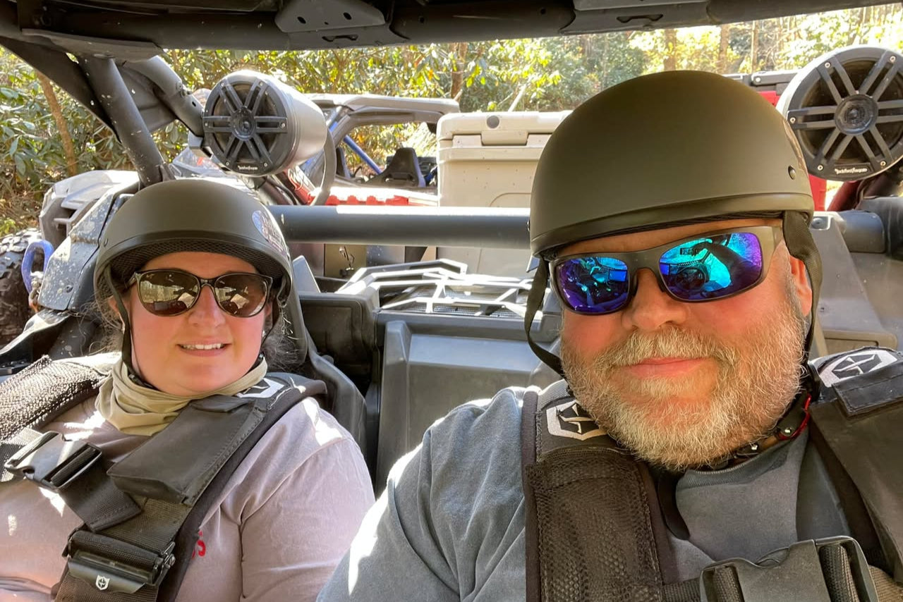 two people wearing Grey axel off road DOT certified trail rocker helmet